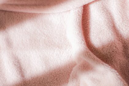 close up photography of a pink fabric